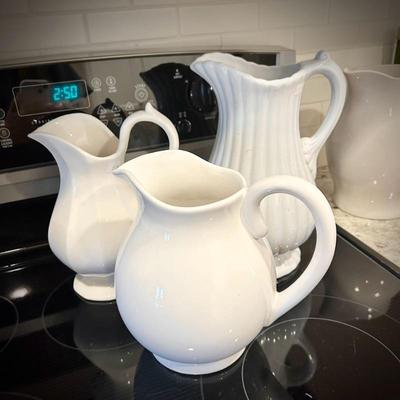 Collection of white/ivory pitchers