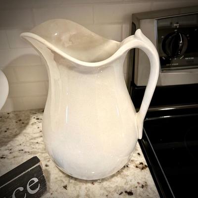 Collection of white/ivory pitchers