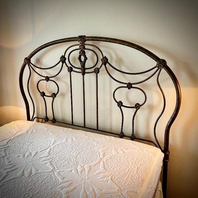 Queen-size iron bed with Serenity mattress