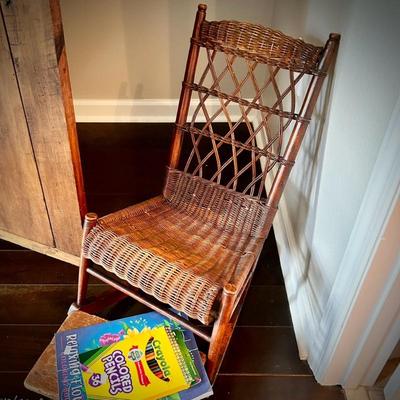 Antique child's wicker rocking chair
