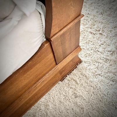 Queen-size sleigh bed with hidden cedar drawer