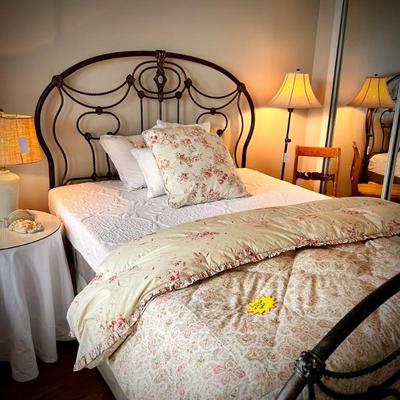 Queen-size iron bed with Serenity mattress