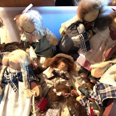 4 bins full of Lizzie High wooden dolls