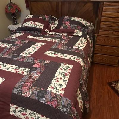 full size bed with drawers on base 