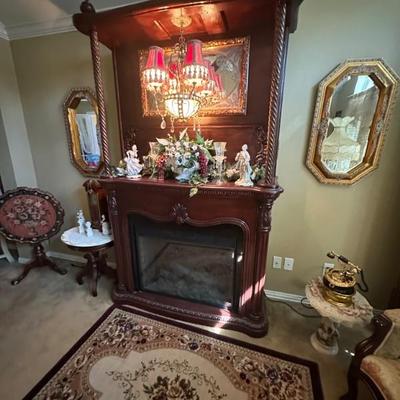 handmade piano mantel with light and fireplace 