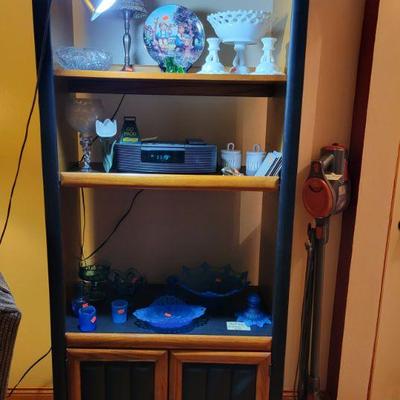 Blue Glassware and Bookshelf 