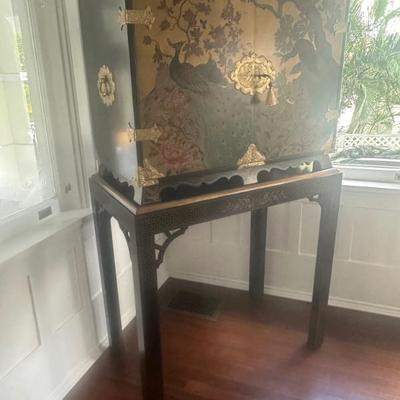 Theodore Alexander Althrop living history peacock bar cabinet 
64” tall. 37” wide 19” deep