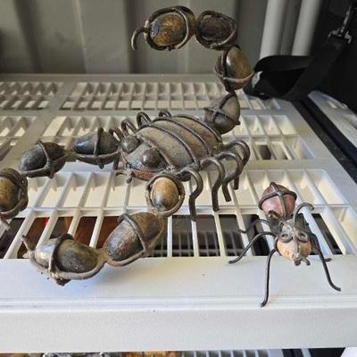 #8028 • (2) Metal/Rock Sculptures
