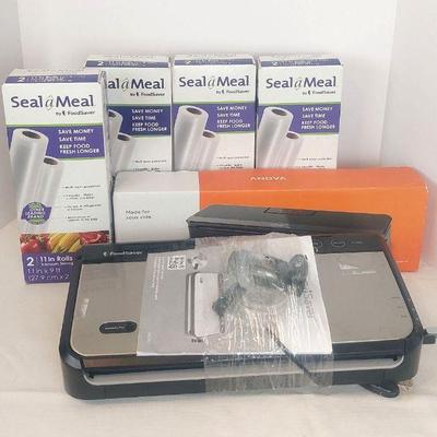 Vacuum Sealers (2) Anova and FoodSaver With 4 Boxes Of Vacuum Storage Bags