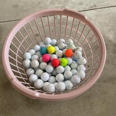 Lot 178 | Laundry Basket Full of Golf Balls
