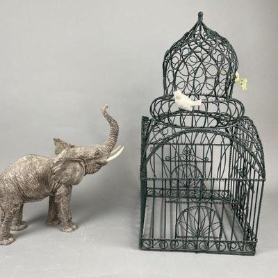 Lot 146 | Elephant Statue and Birdcage
