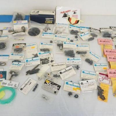 1229	LARGE ASSORTMENT HIROBO & SHUTTLE, TECH SPECIALTIES MODEL R/C HELICOPTER PARTS, NEW OLD STOCK
