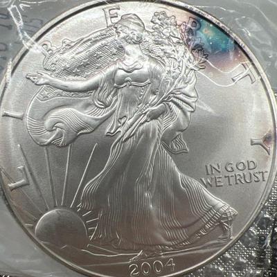 2004 One Ounce Fine Silver Uncirculated American Eagle Walking Liberty Dollar Coin
