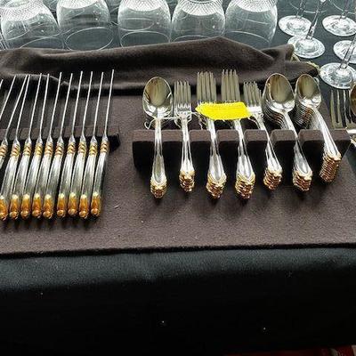 New full set of Mikasa flatware with serving pieces