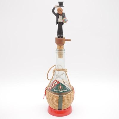 Glass Chianti Bottle with Carved Wooden Man Stopper and Mechanical Feature