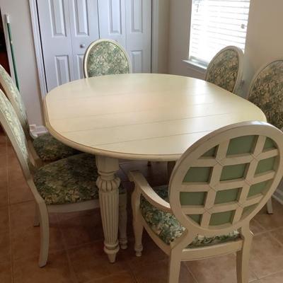 $299-Lexington table and 6 chairs, 2 are captains, 31"H 52"L 52"W plus 2-16"leaves 