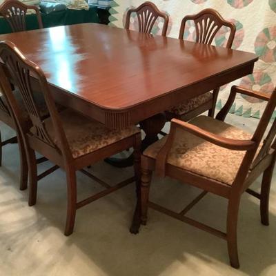 $249- table with 6 chairs, captain's chair with condition issues 30"H 60"L 42"W