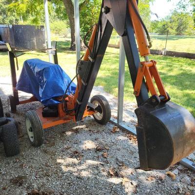 Towable powered excavator