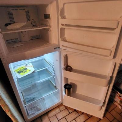 Practically new refrigerator  24" w x 26" D x 60" H