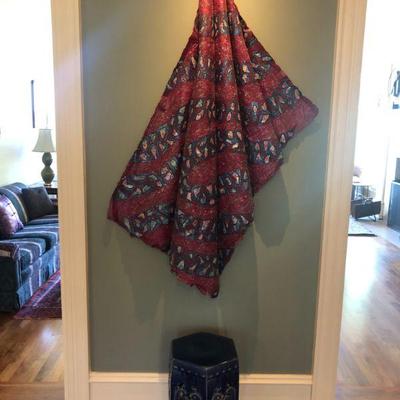 5ft Tall Paper Mache Blanket Wall Hanging. Blue Ceramic Garden Stool. H 21in | Diameter 14in.