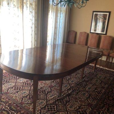 Beautiful Camaro Dining Table Made in France.  It has a total of 4 Leaves. As shown it has 3 leaves added extending it to 9ft. Seats 10 -...