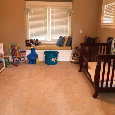 Child's room. Crib/Bed, Small Chairs, Rocking Chair, Book Case, Stuffed Toys