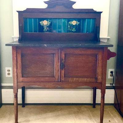 Antique English oak marble-top side board with tiled backsplash