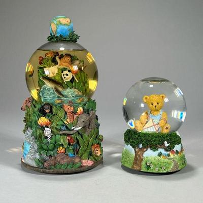(2pc) Animal Snowglobes | Including a Cherished Teddies / Enesco musical snow globe with a bear with kite, and a snow globe with many...