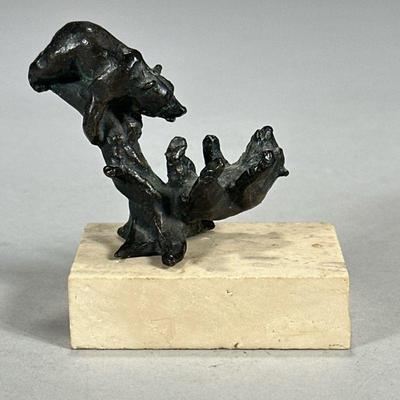 SIGGY PUCHTA (1933-2015) BRONZE SCULPTURE | Small bronze sculpture by Siggy Puchta depicting two bears on a tree mounted on travertine,...