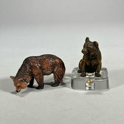 (2pc) Bronze & Metal Bear Figures | Of small size, including a seated bear in bronze mounted to a lucite stand, and a cold-painted...