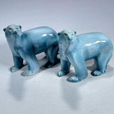 (2pc) PAIR CERAMIC POLAR BEARS | Light blue glazed ceramic polar bears. - l. 7 x w. 3 x h. 5.5 in

