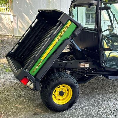 DIESEL JOHN DEERE GATOR 855D 4X4 SIDE-BY-SIDE WITH DUMP BED | 855D John Deere side-by-side with enclosed cab with glass doors, power...