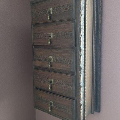Lot #124 - Vintage Wall-Mounted Wooden Storage Cabinet with Decorative Carvings