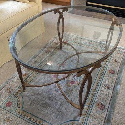 Lot #12 - Glass Top Coffee Table with Decorative Metal Base