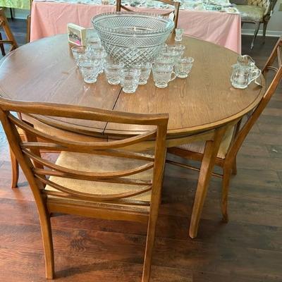 MCM meets French Provincial • Dining Table • plus Six Chairs • 48” Diameter • (extends to 72” with two 12” leaves) • $600 •
(includes...