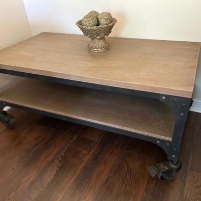 Industrial Style • Cocktail Table • w/Metal Casters • 42”l x 22”w x 18”h • $48