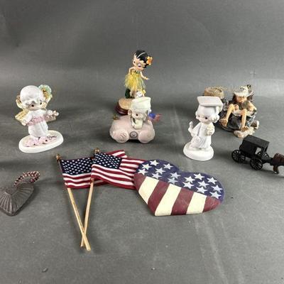 Lot 300 | Vintage Variety Precious Moments, Flags & More
