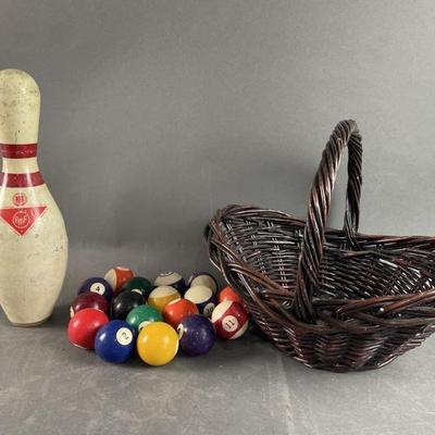 Lot 89 | Pool Balls, Basket, and Bowling Pin
