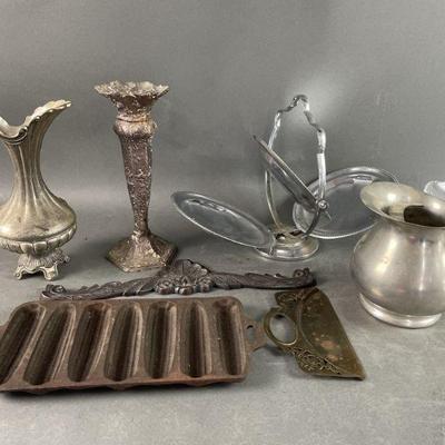 Lot 146 | Sterling, Pewter, Cast Iron, and More
