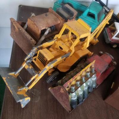 Assorted vintage toy trucks