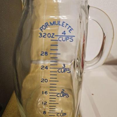 Baby formula measuring cup
