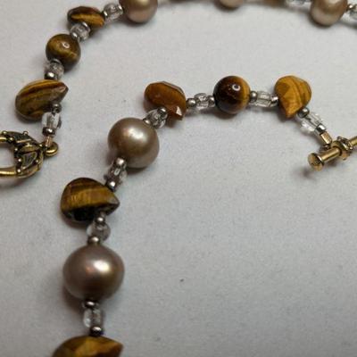 Tigers eye stones with beads and sterling silver clasp
