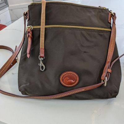 Black Dooney and Bourke purse with leather strap
