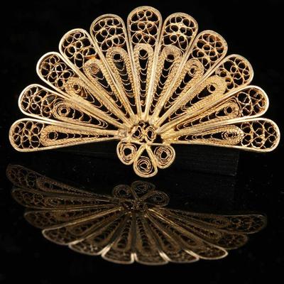 Gold over sterling silver filigree brooch