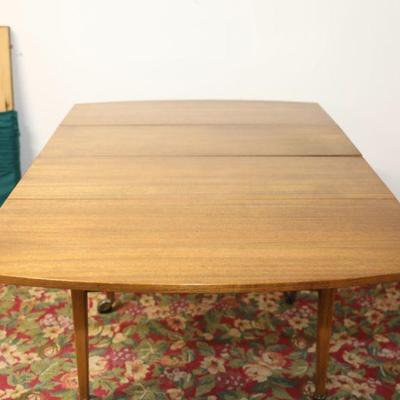 American of Martinsville MCM Rolling drop-leaf dining table with 3 leaves