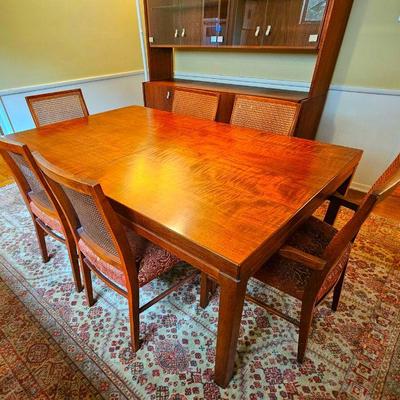 Danish Modern dining table, 6 cane back chairs & 2 leaves. Very good condition.