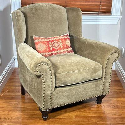 Crate & Barrel Wingback Chair | Olive green chenille upholstery with brass tacks on the arm fronts and sides. - l. 39 x w. 34 x h....