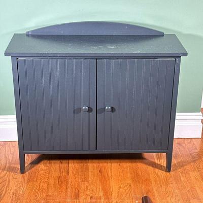 Blue Painted Side Cabinet | Contemporary country chic, having bead board cabinet doors before two shelves; with wire hole on the back to...