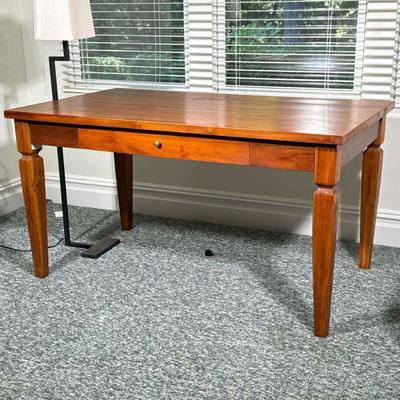 Crate & Barrel Desk / Work Table | Of nicely figured wood, having a single drawer over square tapering legs. - l. 54 x w. 32 x h. 29...