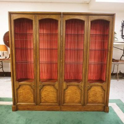 1218	BAKER FURNITURE 2 PART MAHOGANY WALL DISPLAY CABINET WITH INTERIOR GLASS SHELVES AND 4 DRAWERS, APPROXIMATELY 82 IN X 17 IN X 81 IN H
